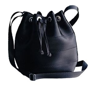 Harveys Seatbelt mini bucket bag. Edgy rocker small mini handbag.